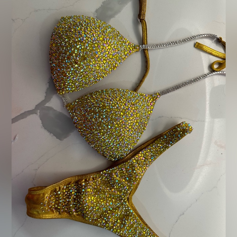 Custom wellness posing suit worn twice.